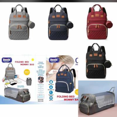 Folding bed mommy bag